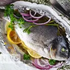 Pieczone dorado w piekarniku w folii - przepis kulinarny